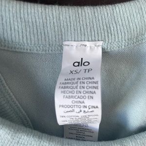 XS alo yoga top. Limited edition. Light blue tight cute fit. Super flattering